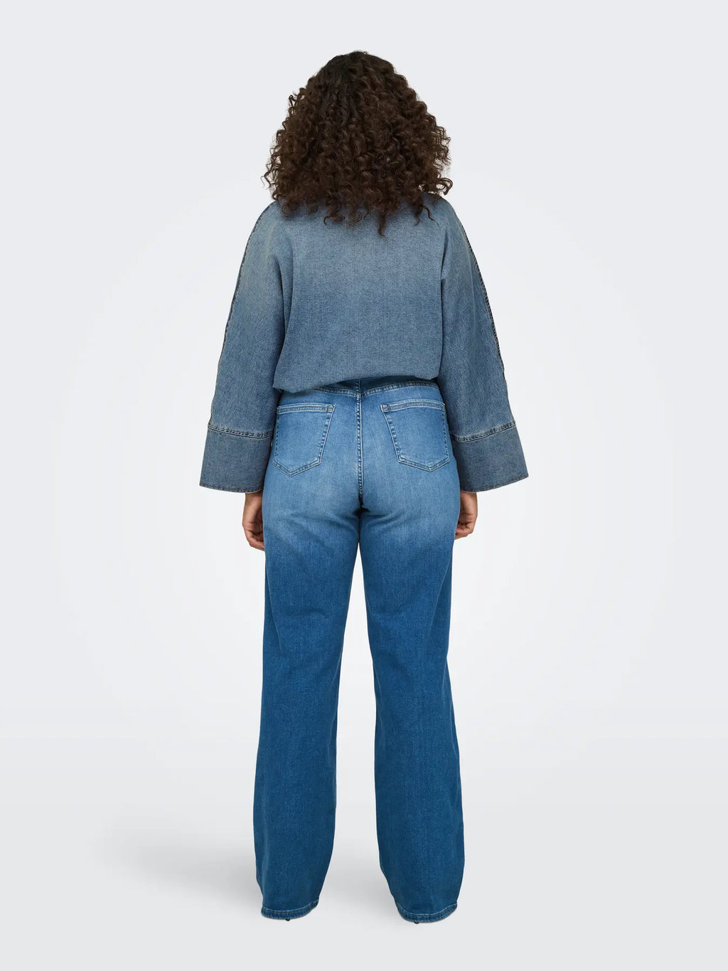 Jeans gamba ampia lavaggio medio taglie curvy